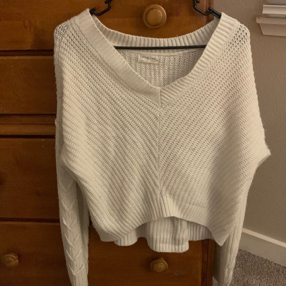 White v-neck sweater from the brand Full Circle Trends.